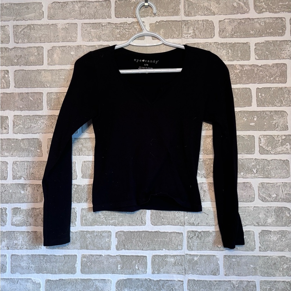 Tight black cropped long sleeve. Brand is Eye Candy. In good condition